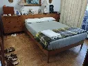 0112 Dormitorio compuesto por 2 mesillas-cómoda, mantero y cama (3).webp